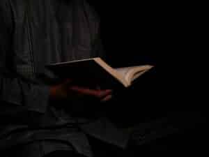 muslim man reading the Quran during ramadan