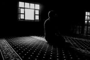 muslim man praying laylat al qadr during the last 10 days
