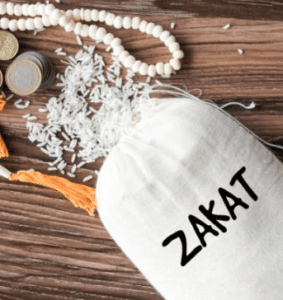 muslims give zakat during month of ramadan