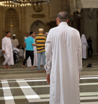 muslims in a mosque praying to Allah after the adhan has been called