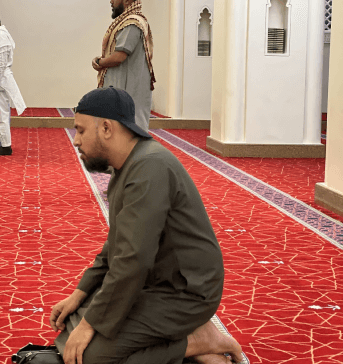 muslims praying magrib and isha prayer